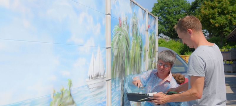 Arbeiten an derGraffiti-Wand